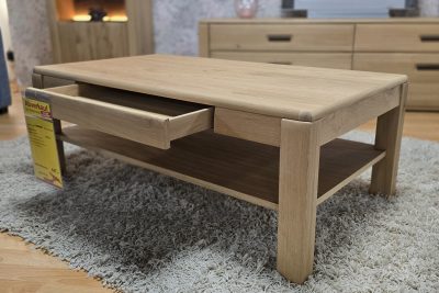 in Ast/Balkeneiche massiv mit Schubkasten. B 115 H 44 T 65 cm.