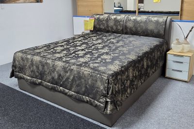 Polsterbett im Stoff anthrazit gold geblümt, in 180 x 200 cm mit Bettkasten, Bonellfederkern-Matratzen H3, Doppelflexrahmen und Tagesdecke.